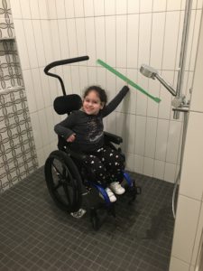 Andrea helping with grab bar placement